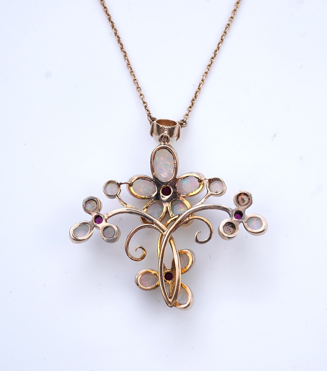 An opal and garnet pendant necklace, circa 1900
